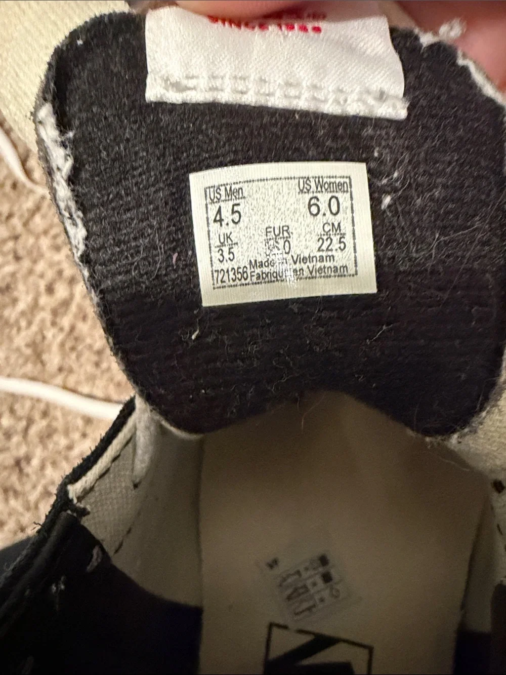 Vans women Black and White High-Top Sneakers